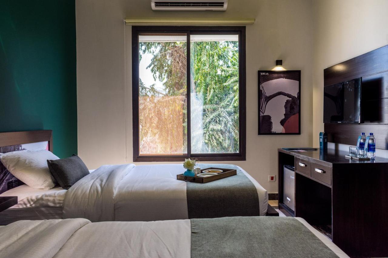 Lokal Rooms X Shahrah-E-Faisal Karachi Buitenkant foto