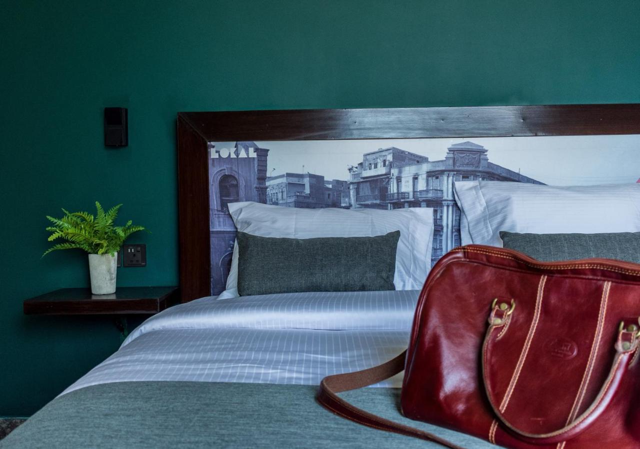 Lokal Rooms X Shahrah-E-Faisal Karachi Buitenkant foto
