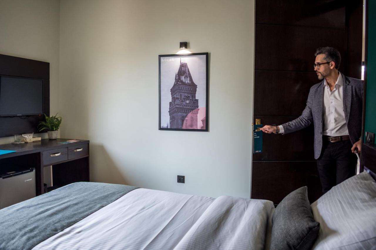 Lokal Rooms X Shahrah-E-Faisal Karachi Buitenkant foto