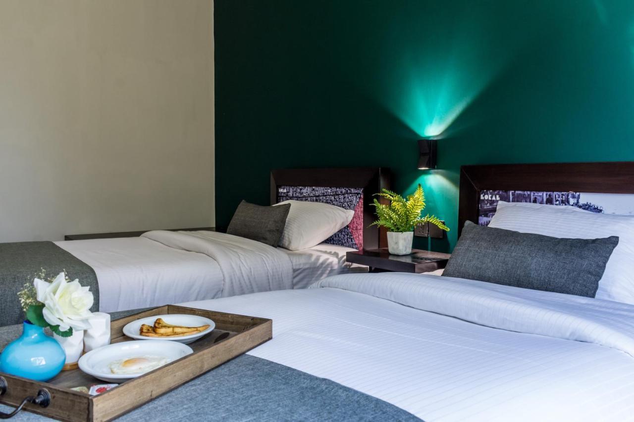 Lokal Rooms X Shahrah-E-Faisal Karachi Buitenkant foto